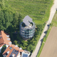 Illustration for article titled These Buildings Can Actually Move by Rotating